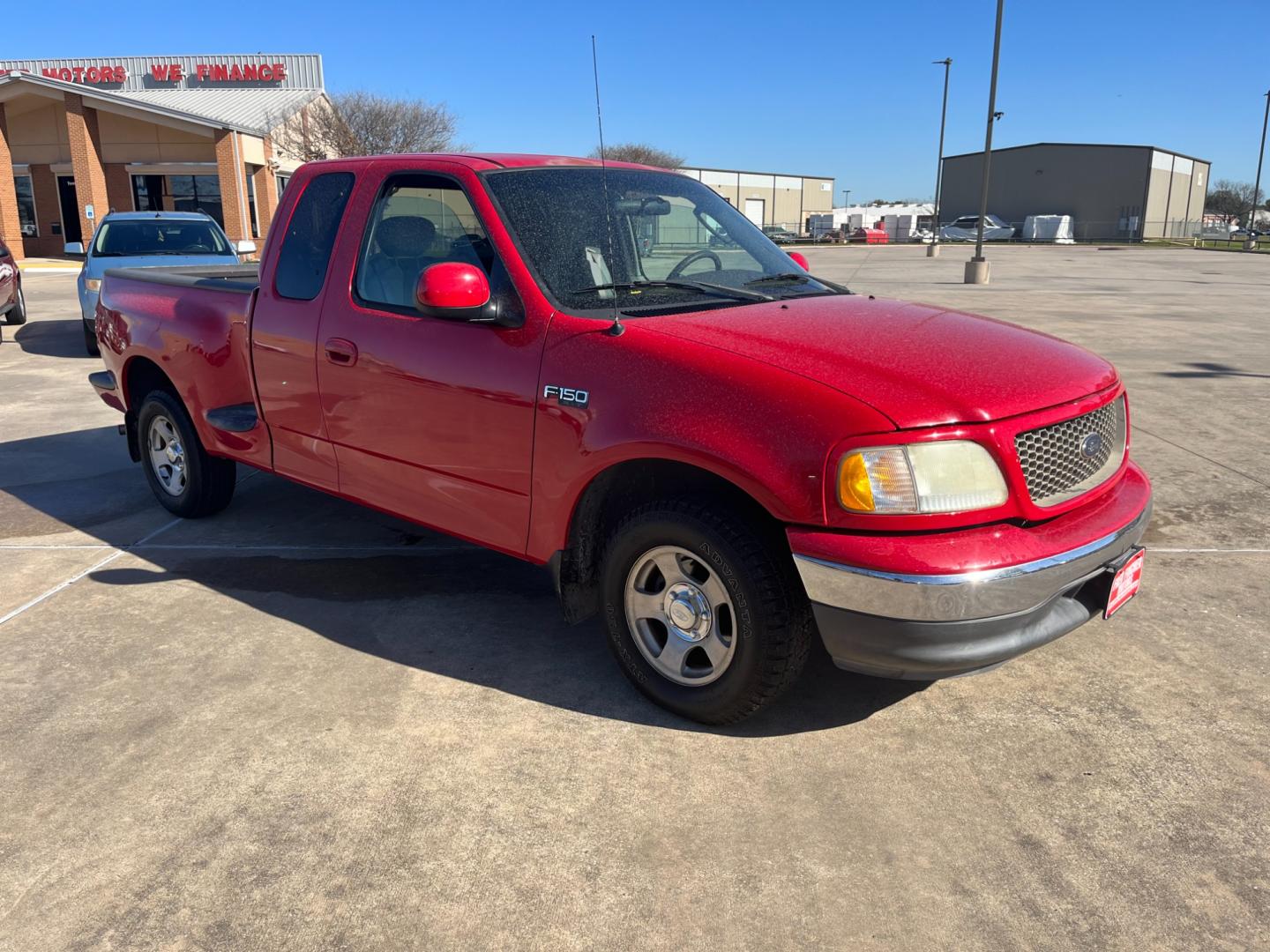 2003 red /TAN Ford F-150 XL SuperCab Flareside 2WD (1FTRX07213K) with an 4.2L V6 OHV 12V engine, Automatic transmission, located at 14700 Tomball Parkway 249, Houston, TX, 77086, (281) 444-2200, 29.928619, -95.504074 - Photo#0